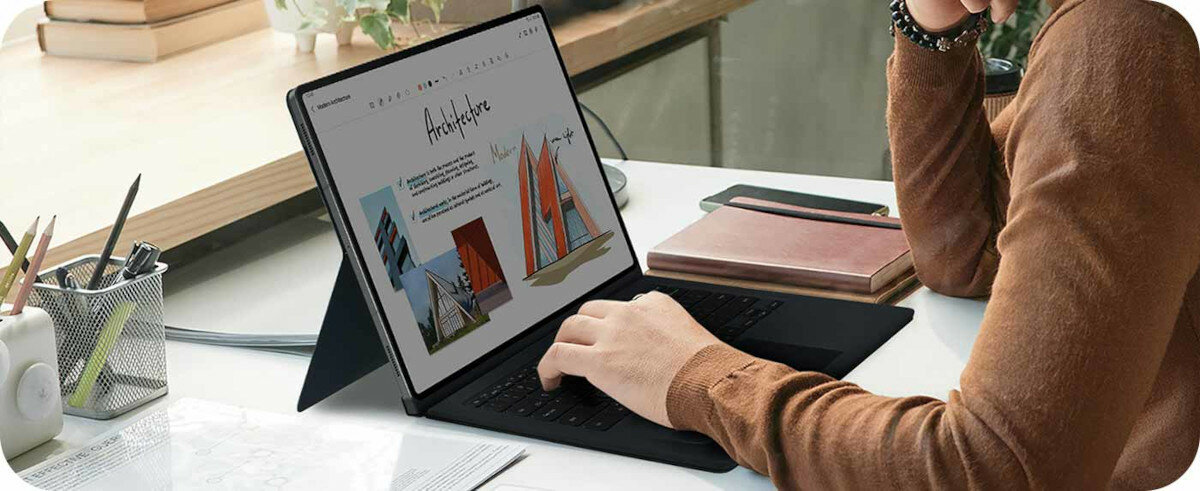 Tablet Samsung Galaxy Tab S9 grafika przedstawiająca mężczyznę pracującego na tablecie postawionym na biurku w Etui Smart Book Cover