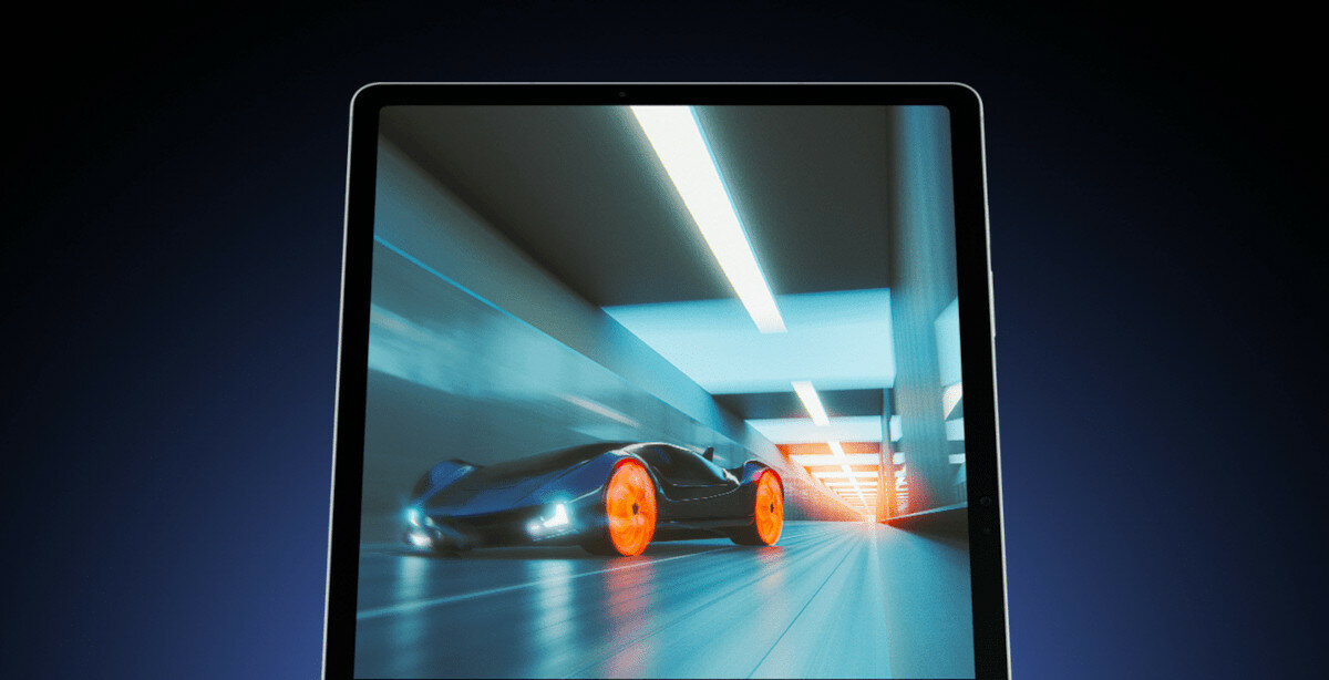 Tablet Samsung Galaxy Tab S9 FE grafika przedstawiająca jadący samochód na tablecie